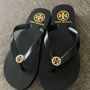 Tory Burch Black Flip Flop Sandals with Gold Logo
